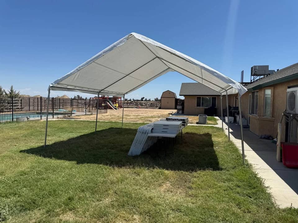 White wedding tent and canopy rental setup for outdoor events